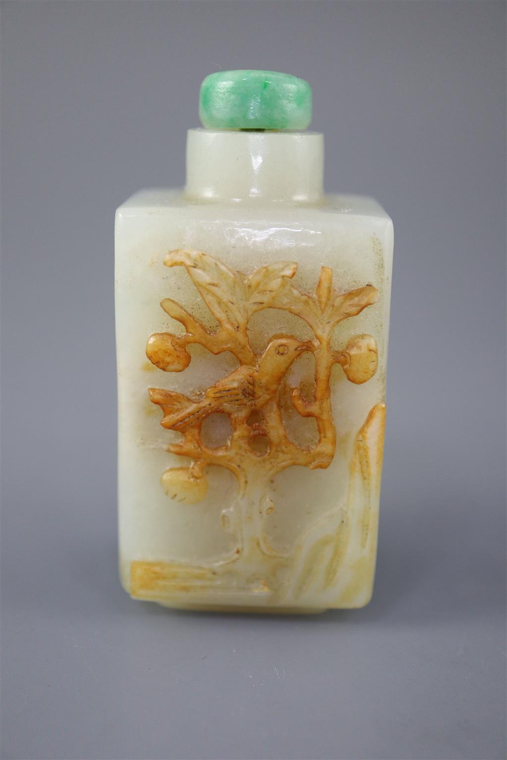 A Chinese pale celadon and russet jade rectangular snuff bottle, 19th century, 5.7cm excl. stopper